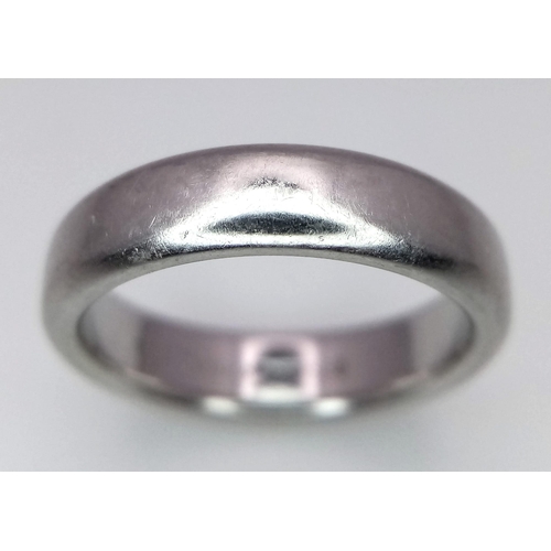 82 - Tiffany and Co Platinum 4mm rounded band ring. 8.2g. Size K.