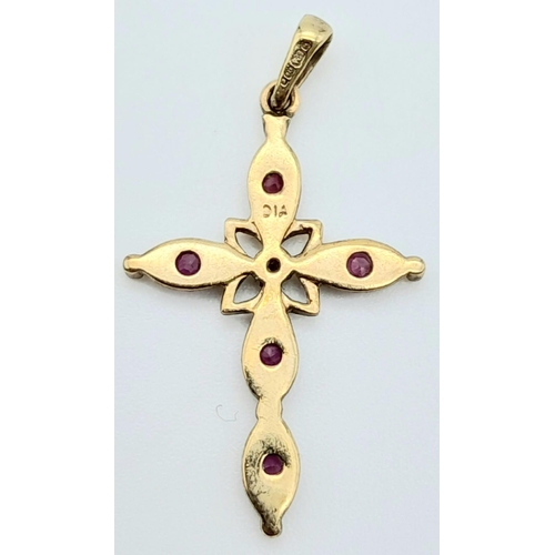 855 - A 9K YELLOW GOLD DIAMOND & RUBY SET CROSS PENDANT 0.8G , 25mm x 16mm

A/S 2007