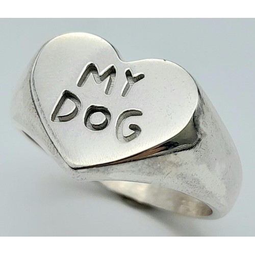 990 - A STERLING SILVER HEART SHAPED SIGNET RING ENGRAVED WITH MY DOG AND ON THE INSIDE OF THE RING IS THE... 