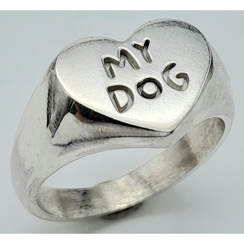 990 - A STERLING SILVER HEART SHAPED SIGNET RING ENGRAVED WITH MY DOG AND ON THE INSIDE OF THE RING IS THE... 