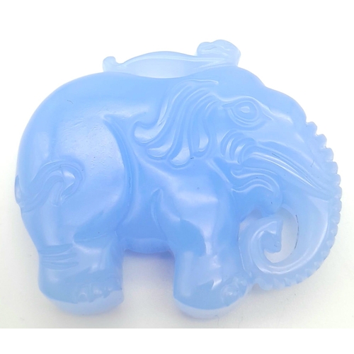 474 - A Sky Blue Jade Decorative Elephant Pendant. 5cm x 4cm.