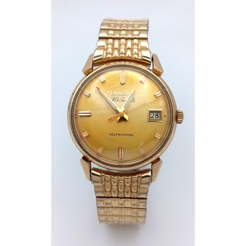 65 - A Vintage 1960s Bulova Self-Winding Gents Watch. Gold plated expandable strap. Gold plated case - 32... 