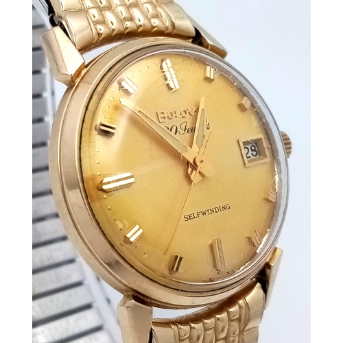 65 - A Vintage 1960s Bulova Self-Winding Gents Watch. Gold plated expandable strap. Gold plated case - 32... 