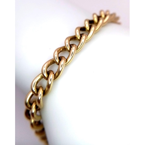 323 - A HEAVY 9K GOLD INTERLINK BRACELET WITH HEART PADLOCK AND SAFETY CHAIN .  22.6gms   18cms