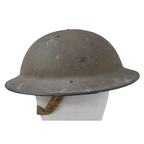 33 - A Rare Polish (Named) Polish WW2 Helmet. The shell and liner are British and are dated 1941 and 1940... 