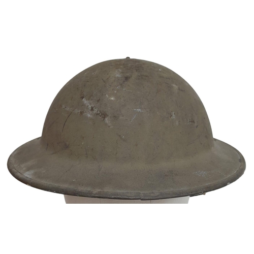 33 - A Rare Polish (Named) Polish WW2 Helmet. The shell and liner are British and are dated 1941 and 1940... 