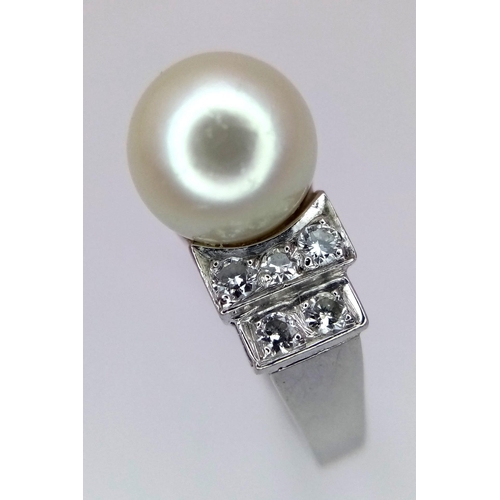 432 - A PLATINUM DIAMOND & PEARL RING - 0.30CT. 5.7G. SIZE N.