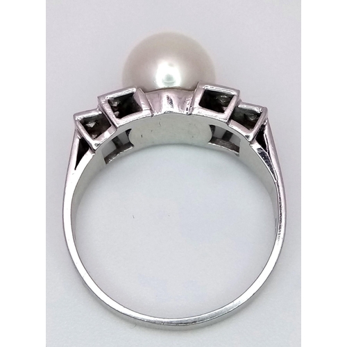 432 - A PLATINUM DIAMOND & PEARL RING - 0.30CT. 5.7G. SIZE N.