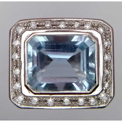 122 - AN 18K WHITE GOLD DIAMOND & AQUAMARINE RING. 10.6G. SIZE J. APPROX 4CT AQUAMARINE.