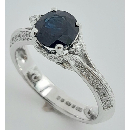 130 - A 18K WHITE GOLD DIAMOND & SAPPHIRE RING 1.22CT ROUND SAPPHIRE. Total weight: 4G SIZE H

ref: SP 200... 