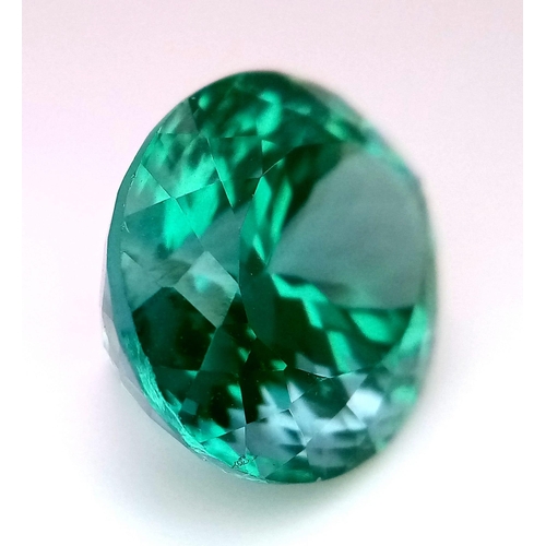 1366 - An 22ct Attractive Blue/Green Tourmaline Gemstone. Oval cut with a trillion base. Well faceted. No v... 