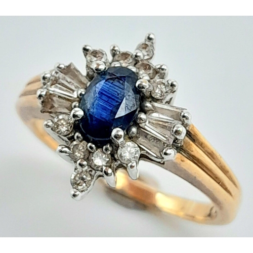 149 - A 9K YELLOW GOLD DIAMOND & SAPPHIRE CLUSTER RING, IN THE FLORAL DESIGN. WITH THE COMBINATION OF BAGU... 