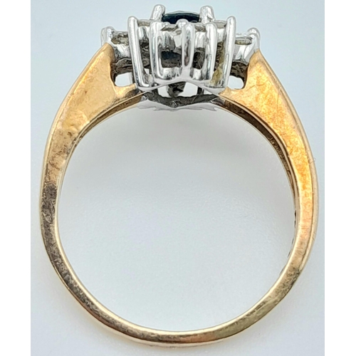 149 - A 9K YELLOW GOLD DIAMOND & SAPPHIRE CLUSTER RING, IN THE FLORAL DESIGN. WITH THE COMBINATION OF BAGU... 