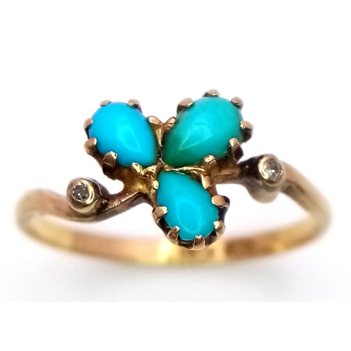 257 - An antique 9 K yellow gold ring with a trilogy of turquoise and two old cut diamonds on the shoulder... 