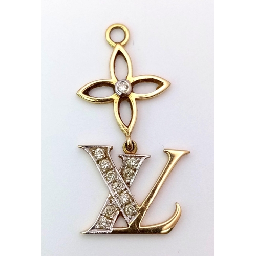 459 - AN 18K YELLOW GOLD DIAMOND SET LV STYLE PENDANT 2.2G