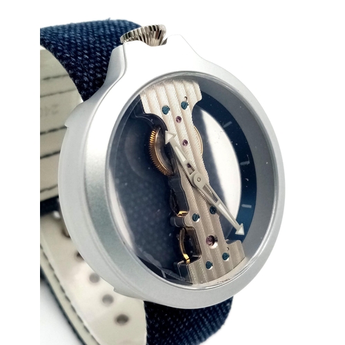 464 - A Verticale Mechanical Top Winder Gents Watch. Blue Denim strap. Ceramic skeleton case - 42mm. As ne... 