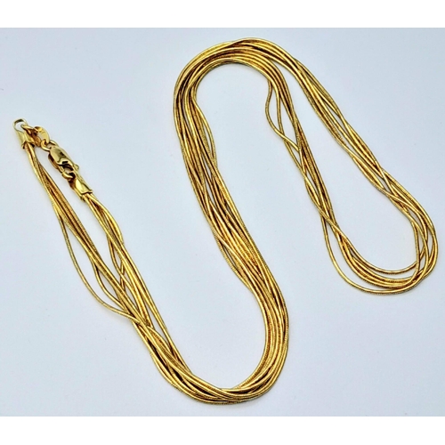 58 - A very feminine, 9 K yellow gold, four chain necklace.  length: 43 cm, weight: 9 g.