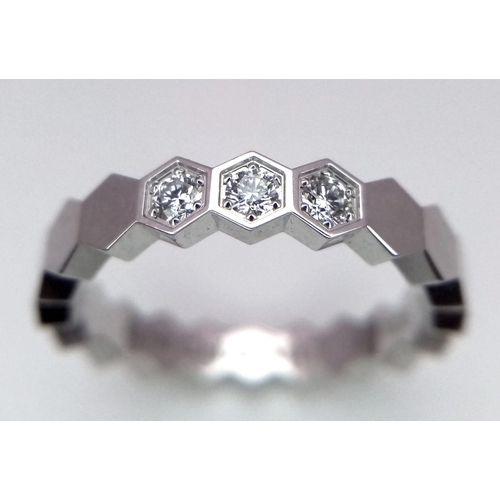 60 - AN 18K WHITE GOLD DIAMOND RING DESIGNED BY CHAUMET - BEE MY LOVE HONEYCOMB COLLECTION. 3.6G SIZE K R... 