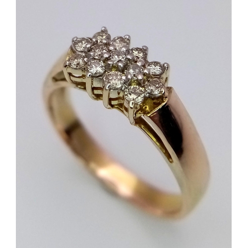 803 - A 14K YELLOW GOLD DIAMOND RING. 0.30CT 3.1G SIZE M 1/2.