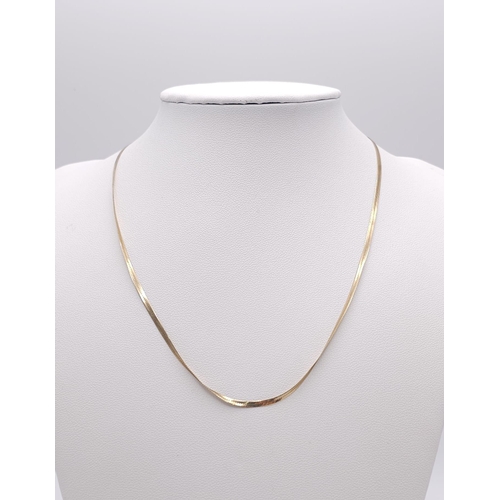 93 - A wonderful, 9 K yellow gold, flat chain necklace and bracelet set. Necklace length: 41 cm, bracelet... 