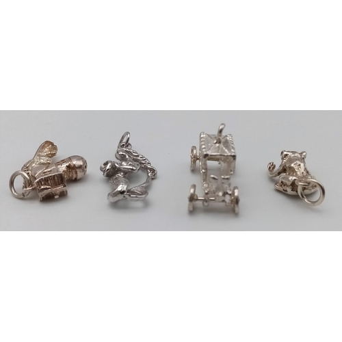 1218 - A Sterling silver selection of 4 charms, including carriage, frog, shoe and mermaid, 9.8g total

ref... 