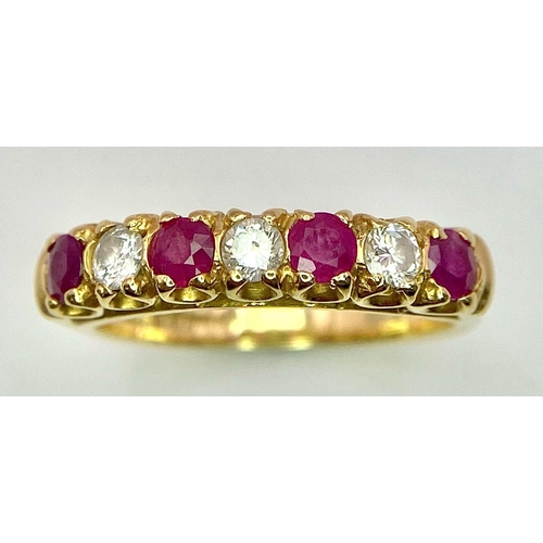 12 - A 9 K yellow gold ring with round cut rubies alternating with round cut diamonds. Ring size: J, weig... 