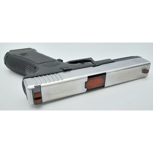 1287 - A Replica Full Size Glock 17. 20cm Length. Action Works with pull back slide and working trigger. Po... 