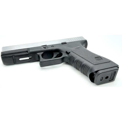 1287 - A Replica Full Size Glock 17. 20cm Length. Action Works with pull back slide and working trigger. Po... 