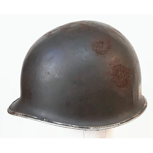 13 - WW2 US Fixed Bale M1 Helmet, with insignia of the 90th Infantry Division.