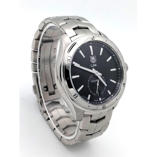 17 - A Tag Heuer Link Calibre 6 Automatic Watch. Stainless steel bracelet and case - 41mm. Black dial wit... 