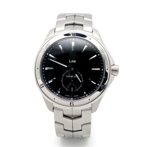 17 - A Tag Heuer Link Calibre 6 Automatic Watch. Stainless steel bracelet and case - 41mm. Black dial wit... 