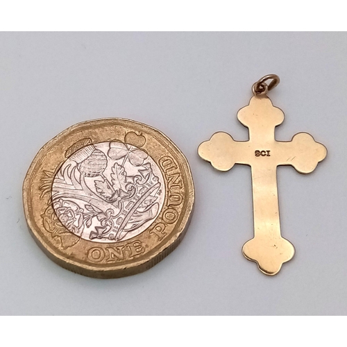 233 - A 9 K yellow gold cross pendant, dimensions: 27 x 18 mm, weight; 1 g.