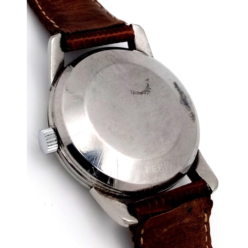 24 - A Vintage Omega Seamaster Calendar Gents Watch. Brown leather strap. Stainless steel case - 33mm. Ho... 