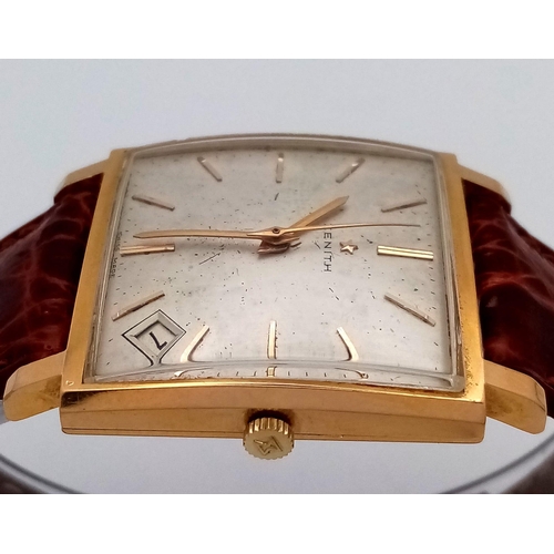 31 - A Vintage 18K Gold Cased Zenith Gents Watch. Crocodile strap. 18k gold rectangular case - 30mm width... 