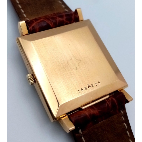 31 - A Vintage 18K Gold Cased Zenith Gents Watch. Crocodile strap. 18k gold rectangular case - 30mm width... 