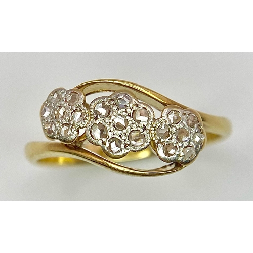 324 - AN 18K YELLOW GOLD & PLATINUM VINTAGE TRIPLE CLUSTER TWIST RING. 3G. SIZE P