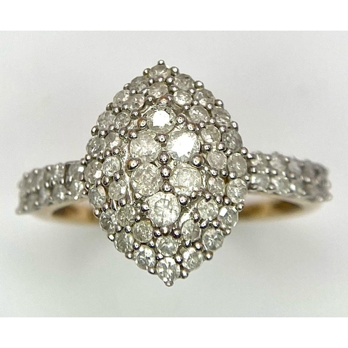 353 - A 9K YELLOW GOLD DIAMOND CLUSTER RING. 0.50CT. 3.1G SIZE R 1/2.