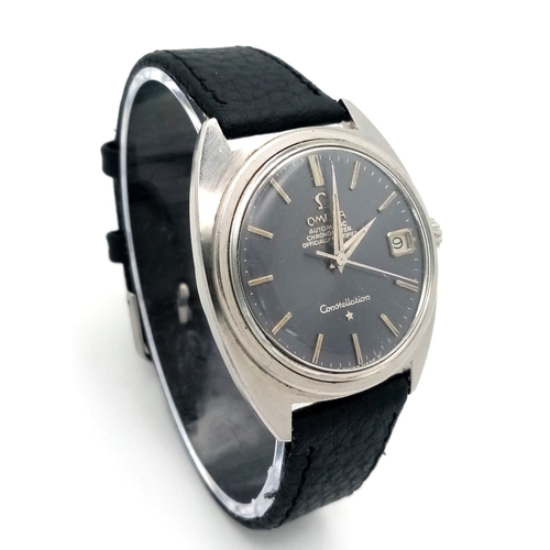 369 - A Vintage Automatic Omega Constellation. Black leather strap. Stainless steel case - 36mm. Grey dial... 