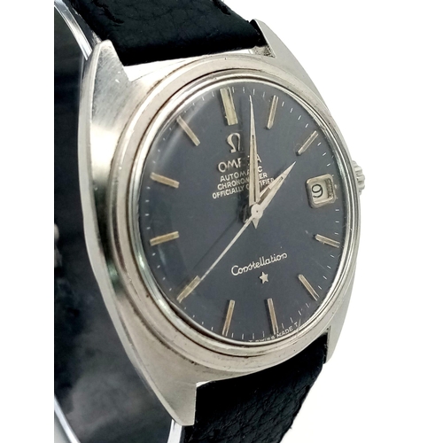 369 - A Vintage Automatic Omega Constellation. Black leather strap. Stainless steel case - 36mm. Grey dial... 