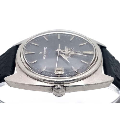 369 - A Vintage Automatic Omega Constellation. Black leather strap. Stainless steel case - 36mm. Grey dial... 