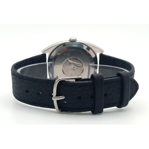 369 - A Vintage Automatic Omega Constellation. Black leather strap. Stainless steel case - 36mm. Grey dial... 