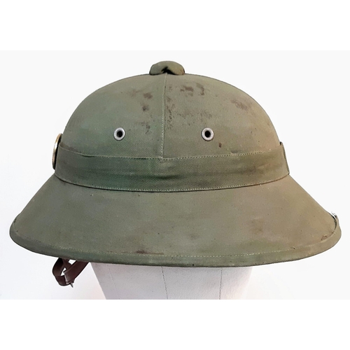 433 - Original 1960’s North Vietnamese Army “Mu Bo Doi” Fibre Helmet. Still has label inside.