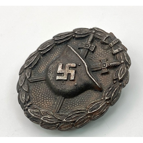 438 - German Condor Legion, Black Wound Badge 3rd Class. Early solid back type from the Spanish Civil War