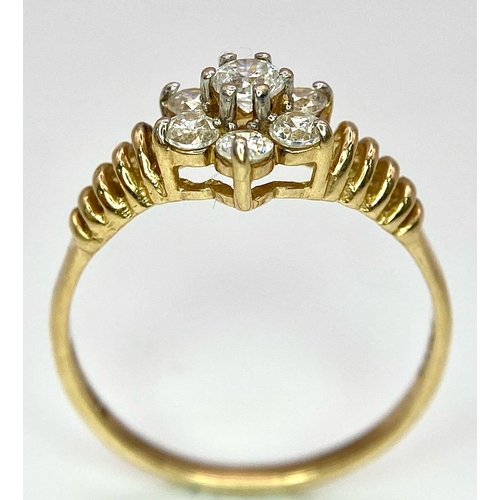 5 - A very showy 14 K yellow gold ring with a cluster of Cubic Zirconia on top. Ring size: N1/2, weight:... 