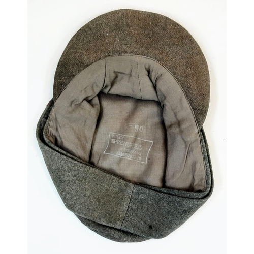 64 - 3rd Reich Waffen SS M43 Cap. very small cut on the top. A real “Been There” item.