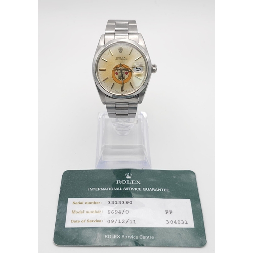 591 - A ROLEX OYSTERDATE IN STAINLESS STEEL SPORTING THE EAGLE LOGO OF ABU DHABI .(DIAL NEEDS CLEANING)  3... 