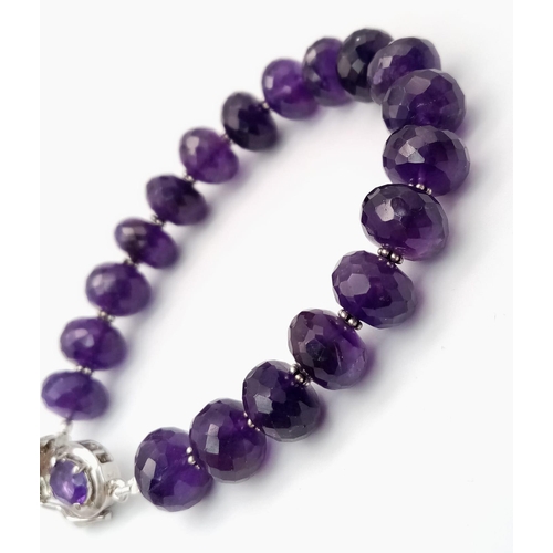 1122 - A 155ct Beautifully Faceted Amethyst Gemstone Bracelet with 925 Silver Amethyst Clasp. 18cm length. ... 