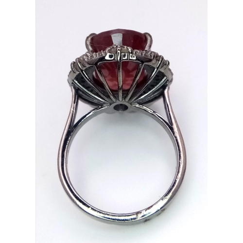 1080 - A Ruby and Diamond Gemstone Ring set in 925 Silver. Central 8ct ruby with a double row 0.80ctw diamo... 