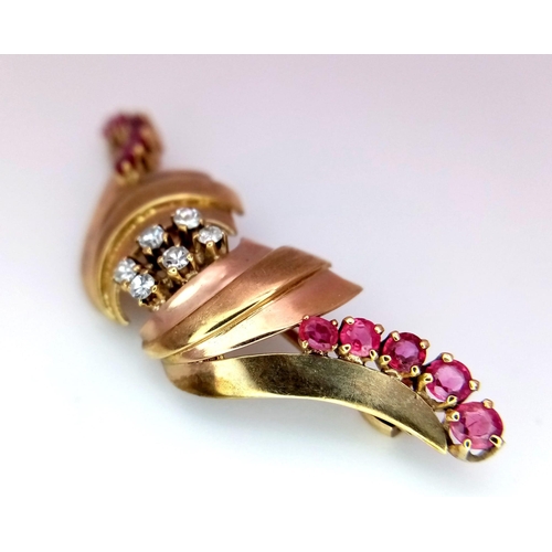 129 - A  vintage, 9 K yellow gold brooch with round cut rubies and white sapphires. Dimensions: 44 x 14 x ... 