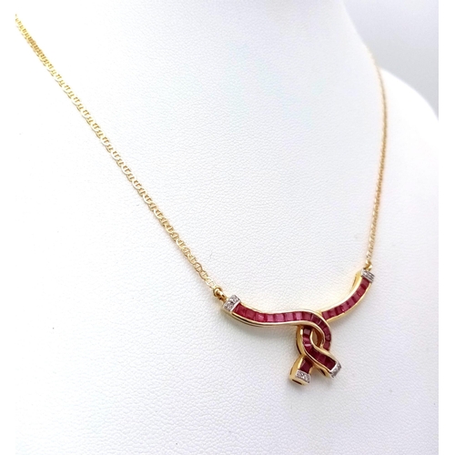 2 - A very elegant 14 K yellow gold chain necklace with a central part loaded with rubies and diamonds i... 